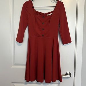 Francesca’s square neck dress in XS. Burnt orange color.